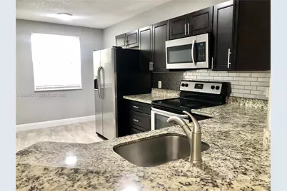 8761 Wiles Rd #306, Coral Springs, FL 33067 - Photo 1