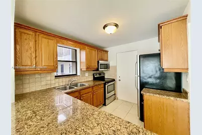 2320 S Cypress Bend Dr #204, Pompano Beach, FL 33069 - Photo 2