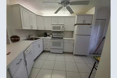 1750 NE 191st St #105-1, Miami, FL 33179 - Photo 1