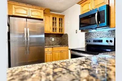1945 NW 29th St #A8, Miami, FL 33142 - Photo 14