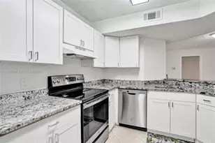 8721 Wiles Rd, Coral Springs, FL 33067 - Photo 14