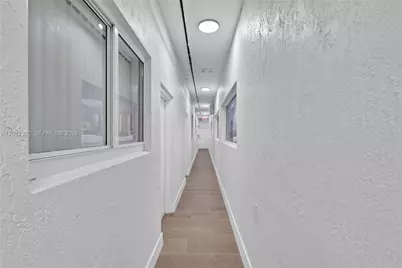 1021 NW 1st St #206, Miami, FL 33128 - Photo 16