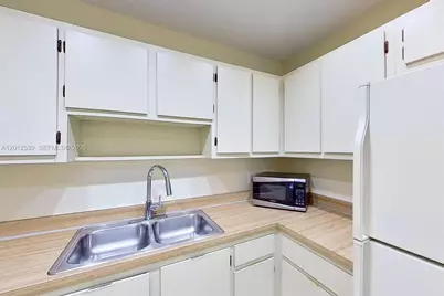2020 NW 119th St #1121, Miami, FL 33167 - Photo 16