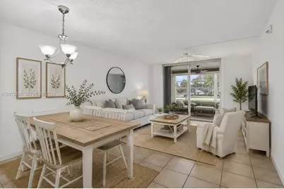 9090 Lime Bay Blvd #203, Tamarac, FL 33321 - Photo 1