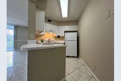 212 Lake Pointe Dr #209, Oakland Park, FL 33309 - Photo 1
