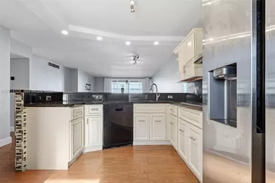 1770 NE 191st St #411-1, Miami, FL 33179 - Photo 2