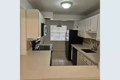 3070 NW 48th Ter #104, Lauderdale Lakes, FL 33313 - Photo 4