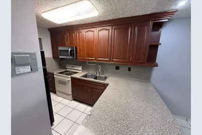 6055 W 19th Ave #215, Hialeah, FL 33012 - Photo 10