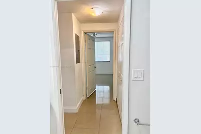 8030 N Nob Hill Rd #105, Tamarac, FL 33321 - Photo 12