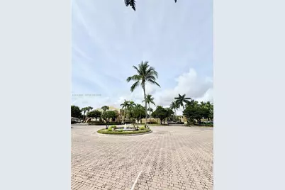 8030 N Nob Hill Rd #105, Tamarac, FL 33321 - Photo 1