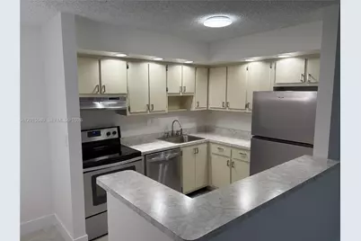 18875 NW 62nd Ave #105, Hialeah, FL 33015 - Photo 1