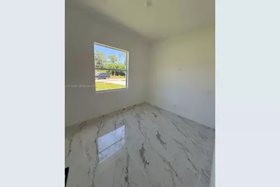 908 Winters St E, Lehigh Acres, FL 33974 - Photo 14
