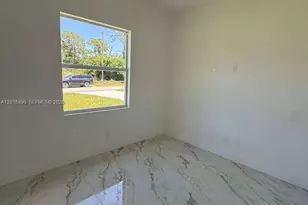 908 Winters St E, Lehigh Acres, FL 33974 - Photo 14