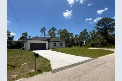 908 Winters St E, Lehigh Acres, FL 33974 - Photo 2