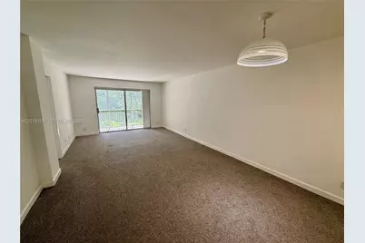1075 Riverside Dr #306, Coral Springs, FL 33071 - Photo 8