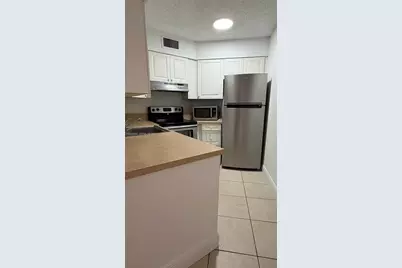 216 Lake Pointe Dr #223, Oakland Park, FL 33309 - Photo 4
