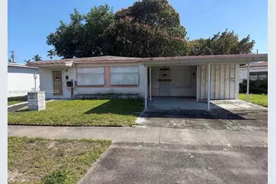 1410 NE 161st St, North Miami Beach, FL 33162 - Photo 1