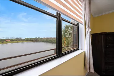 2768 S Carambola Cir S #403, Coconut Creek, FL 33066 - Photo 1
