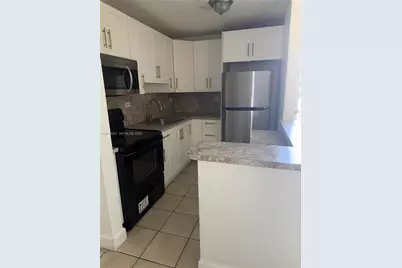 7120 NW 179th St #105, Hialeah, FL 33015 - Photo 2