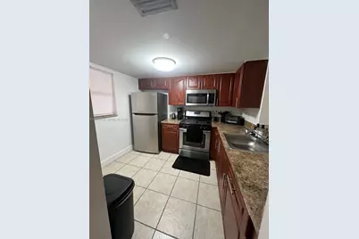 18051 NW 68th Ave #K103, Hialeah, FL 33015 - Photo 1