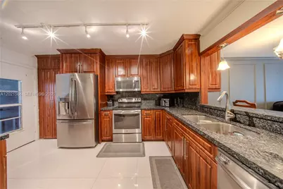 1660 NE 191st St #410-1, Miami, FL 33179 - Photo 2