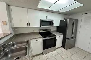 5011 Wiles Rd, Coconut Creek, FL 33073 - Photo 6