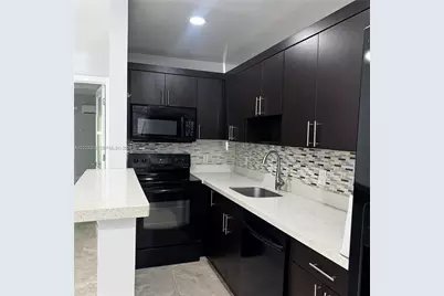 1860 Venice Park Dr #107, North Miami, FL 33181 - Photo 2