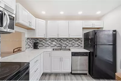 5860 NW 64th Ave #102, Tamarac, FL 33319 - Photo 1