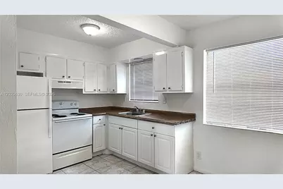 31 SE 2nd Ave #203, Hallandale Beach, FL 33009 - Photo 1