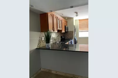 1651 NE 115th St #21C, Miami, FL 33181 - Photo 12