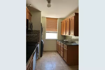 1651 NE 115th St #21C, Miami, FL 33181 - Photo 12
