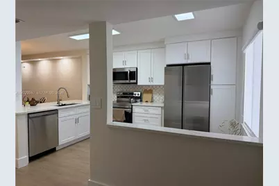 7350 Kinghurst Dr #305, Delray Beach, FL 33446 - Photo 20