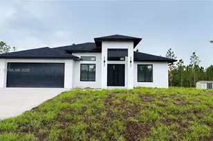 911 Cleveland Ave, Lehigh Acres, FL 33972 - Photo 1