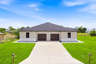225/227 Hightower Ave S, Lehigh Acres, FL 33973 - Photo 1