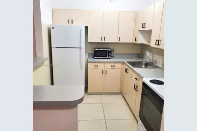 9729 Hammocks Blvd #206E, Miami, FL 33196 - Photo 4