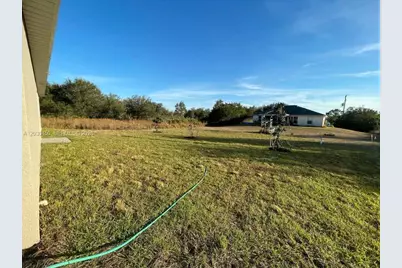 2613 62nd St W, Lehigh Acres, FL 33971 - Photo 12