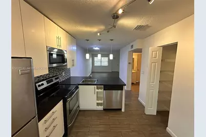 3777 NW 78th Ave #1F, Davie, FL 33024 - Photo 2