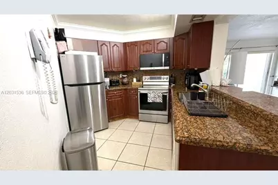 9711 Fontainebleau Blvd #D105, Miami, FL 33172 - Photo 2