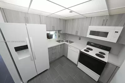 1470 NE 123rd St #A104, North Miami, FL 33161 - Photo 4