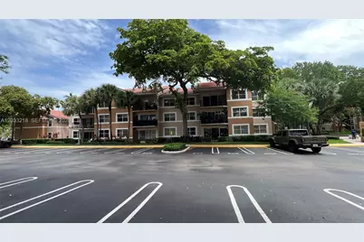 8851 Wiles Rd #108, Coral Springs, FL 33067 - Photo 1