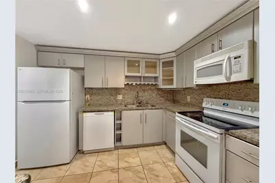 3641 Oaks Clubhouse Dr #201, Pompano Beach, FL 33069 - Photo 12