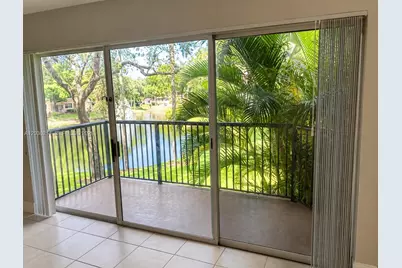 8741 Wiles Rd #204, Coral Springs, FL 33067 - Photo 1