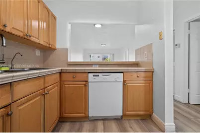 6070 W 18th Ave #209, Hialeah, FL 33012 - Photo 6