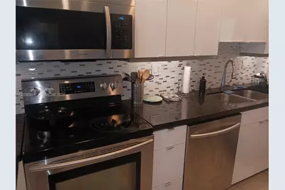 400 Golden Isles Dr #55, Hallandale Beach, FL 33009 - Photo 6