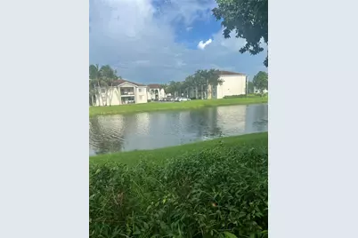 8050 N Nob Hill Rd #102, Tamarac, FL 33321 - Photo 2