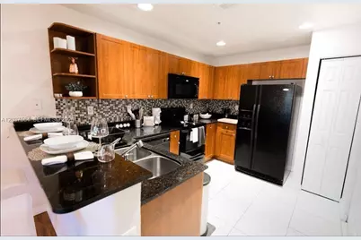 10805 NW 89th Ter #202-4, Doral, FL 33178 - Photo 2