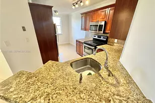 8955 Wiles Rd, Coral Springs, FL 33067 - Photo 4