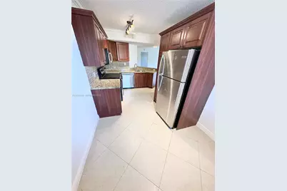 8955 Wiles Rd #208, Coral Springs, FL 33067 - Photo 6