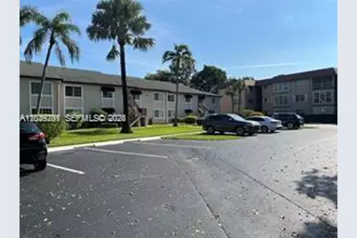 4000 Crystal Lake Dr #111, Deerfield Beach, FL 33064 - Photo 2
