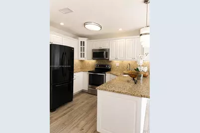 8851 NW 119th St #1206-1, Hialeah Gardens, FL 33018 - Photo 2